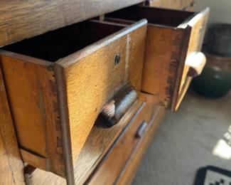 A38 - $400. Hardware / Apothecary Cabinet. All drawers slide. Measures 60" wide x 23" deep x 35" tall.