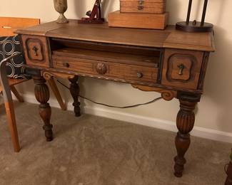 A69 - $125. 1930s Secretary Desk. Measures 41.5" wide x 20.5" deep x 32" tall.