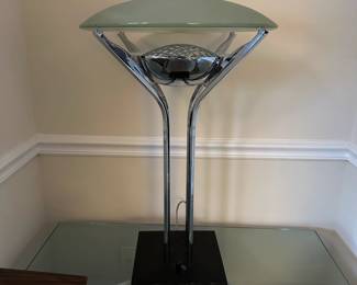 A25 - $40. Chrome Table Lamp with glass shade. Measures 28.5" tall.