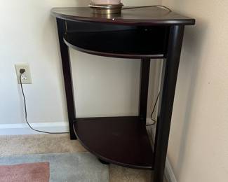 A8 - $20. Black Corner Table Measures 20.5" out from corner x 30.5"T