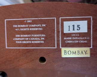 A39 - $80. Bombay Demi Lune Side table. Excellent condition. Measures 28.5" wide x11.5" deep x 31" tall.