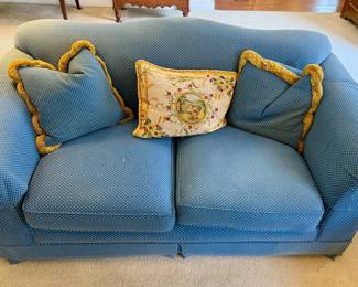 Teal color loveseat and matching sofa