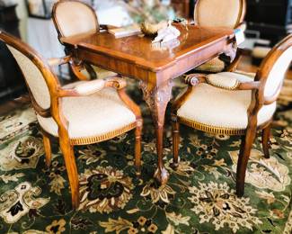 Country French Table with 4 wood and upholstered chairs. Table with butterfly leaf . Quality green floral area rug