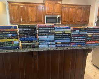 Large selection of Grisham and Patterson books