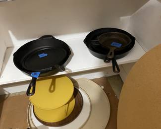 loads of cast iron skillets