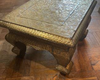 Vintage brass embossed step up foot stool. 