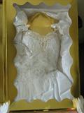 Size 12 - includes the veil.