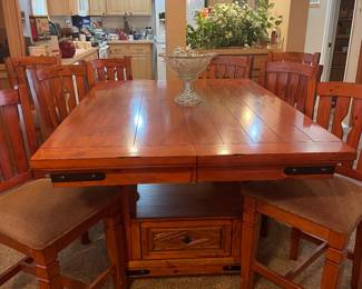 Beautiful expandable rustic farmhouse table with six chairs bar height