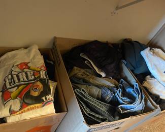 Boxes of Men's clothing, jeans, tshirts