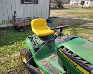 John Deere D100 Riding Mower (needs some work) has new battery