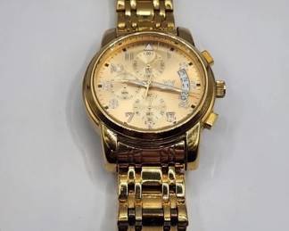 GOLD TONE MENS WATCH. WORKING . GREAT CONDITION.
