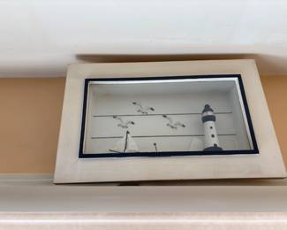 diorama lighthouse and sailboats