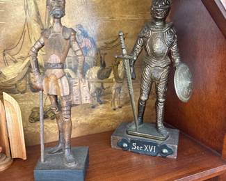 Brass figurine knight on wooden plinth 