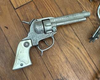 Antique Texan Cap Gun with Longhorn handles 