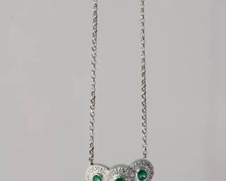 14kt white gold Emerald and Diamond Necklace featuring 3 bezel set oval emeralds approx 1.2ctw each emerald is surrounded by a halo of round cut diamonds on beautiful fancy link chain that measures approx 18" in length, 5.1 grams total weight