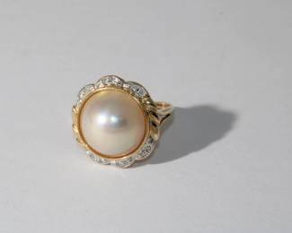 14kt yellow gold Mabe' Pearl & Diamond Ring with bezel set approx 13.5mm Mabe' pearl surrounded by 12 round diamonds on outer edge, 4.65 grams total weight, size 5.5