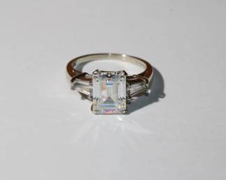 14kt white gold Ring size 7.5 w/ Cz's emerald cut & baquette, 4.63 grams total weight