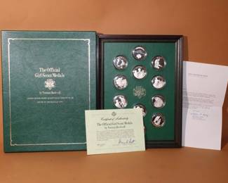 Set of 12 framed Solid Sterling Silver Girl Scout Medals/Coins by  Norman Rockwell