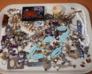 Large group of costume jewelry to include some sterling, gold filled, plated ring, pendants, cuff links,etc