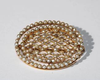 1.25" 14kt Oval Shap Pin covered in seed pearls 4.86 grams total weight