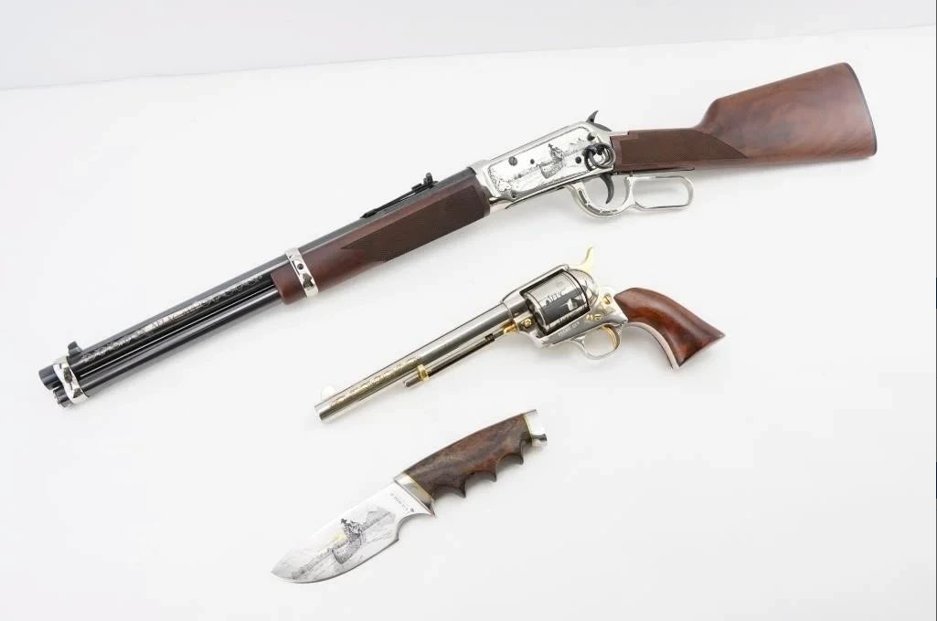 Make: Winchester/ Uberti
Model: AFLAC COMM. SET
Caliber: .45 Colt
Action: Lever
Barrel: 20
Bore: Bright
Serial # 6091236
Condition: Very Good
Exquisitely crafted and limited to 50 sets, this Winchester 94AE .45 Colt commemorative piece is number 19. Commissioned by Aflac and masterfully built by Tom Trolard, renowned author of "Winchester Commemoratives," it features a precision-engineered revolver and a custom knife. Produced in 1994 to honor Aflac’s iconic "Boatman" commercial, it embodies a blend of historic legacy and modern innovation, making it a coveted collectible of exceptional functional excellence and cultural significance. Please see photos.