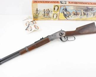 Make: Winchester
Model: 1894 Legendary Lawmans
Caliber: 30-30 WIN
Action: Lever
Barrel: 16
Bore: Bright
Serial # LL08814
Condition: Bright
Rare commemorative Winchester Model 1894 Legendary Lawman lever-action rifle in .30-30 WIN, manufactured in 1977. It features a 16-inch trapper barrel, a nickel receiver adorned with intricate engraved lawman scenes, and a checkered walnut stock. Celebrating the iconic role of lawmen in the Old West, this rifle is in Fine-Excellent condition with its original finish and comes complete with the original box—a culturally significant collectible for discerning enthusiasts. Please see photos.