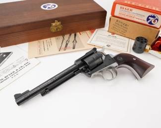 Make: Ruger
Model: Single Six Colorado Cenn.
Caliber: .22 CAL
Action: SA
Barrel: 6
Bore: Bright
Serial # 76-13326
Condition: Excellent
The Ruger Single Six .22 Caliber Colorado Centennial Edition, produced in 1976, commemorates Colorado's centennial year. This special edition revolver features a polished stainless steel finish, custom grips, and a special engraving marking the event. Renowned for its reliability, the Single Six is a versatile single-action revolver, ideal for both target shooting and small game hunting. This model is a collector's piece, combining Ruger's craftsmanship with a historical nod to Colorado's 100th anniversary. Please see photos.