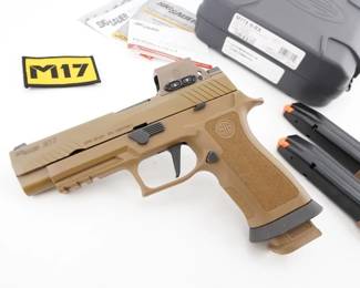 Make: Sig Sauer
Model: M17
Caliber: 9mm
Action: Semi
Barrel: 4.7
Bore: Bright
Serial # M17A107738
Condition: Great
This SIG Sauer M17 9mm sidearm, produced since 2017 and derived from the acclaimed P320 platform, features a striker-fired mechanism and modular design. Adopted by the U.S. Army for its operational reliability, it comes with its original hard case, three magazines, and an upgraded Romeo sight, marking its tactical heritage and cultural significance in modern military history. Please see photos.