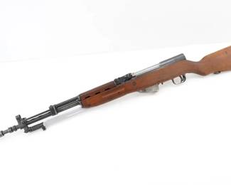 Make: Yugo
Model: M59/66
Caliber: 7.62X39
Action: Semi
Barrel: 25
Bore: Bright
Serial # E119171
Condition: very Good
Importer: CAI
The Yugo CAI M59/66 is a robust 7.62x39mm semi-automatic rifle featuring a folding bayonet and integrated grenade launcher. Produced in Yugoslavia from the 1960s to the 1980s, it was designed for military use and saw widespread deployment during the Yugoslav Wars. Known for reliability, it reflects Cold War-era engineering, making it a collector's favorite. This rifle embodies a rich historical legacy, blending functionality with cultural significance as a staple of Eastern Bloc militaries. Please see photos.