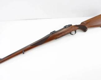 Make: Ruger
Model: M77
Caliber: .270 Win
Action: Bolt
Barrel: 18.5
Bore: Shiny
Serial # 771--06142
Condition: Good
Presenting a vintage Ruger M77 .270 Win Carbine, originally manufactured in 1972 and featuring a custom Manlicker stock. Precision-machined for reliable bolt-action cycling and pinpoint accuracy, this rifle was designed for high-performance hunting. Please see photos.
