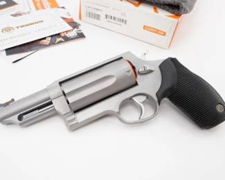 Make: Taurus
Model: The Judge
Caliber: .45 LC/410 GA
Action: DA
Barrel: 3
Bore: Bright
Serial # HR919098
Condition: Great
Importer: Taurus Int'l Mfg
This Taurus The Judge .45/410 GA revolver, produced in 2020, combines the power of both .45 Colt and .410 shotgun shells for versatile performance. Featuring a 3-inch barrel, it boasts a stainless steel frame for durability, a ribbed rubber grip for comfort, and a smooth trigger pull for accuracy. Ideal for personal defense and recreational shooting, this firearm offers reliable versatility. Please see photos.