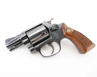 Make: Smith & Wesson
Model: 36
Caliber: .38 S&W SPL
Action: DA
Barrel: 2
Bore: Bright
Serial # 6J1258
Condition: Very Good
This Smith & Wesson 36 Chiefs Special, chambered in .38 SPL, is a classic, compact revolver ideal for concealed carry. Featuring a 1.875-inch barrel, it boasts a blued finish, a smooth double-action trigger, and wood grips. Produced in the early 1970s, this model is known for its reliability and ease of use, making it a sought-after collector’s item. It is in very good condition with minor wear, reflecting its age and quality craftsmanship.
