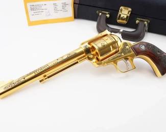 Make: Ruger FL ED.
Model: New Model Super Blackhawk
Caliber: .44 MAGNUM
Action: SA
Barrel: 7.5
Bore: Shiny
Serial # 88-42992
Condition: Excellent
This Ruger New Model Super Blackhawk .44 Magnum is a rare Gold Florida Special, number 5 of only 10 produced. A standout collector's piece, it features a stunning gold finish, elegant engravings, and a timeless single-action design. Manufactured with exceptional craftsmanship and precision, this revolver embodies both performance and rarity. Its limited production and unique designation make it an extraordinary addition to any collection, blending artistry and power seamlessly. Comes with a case. Please see photos.
