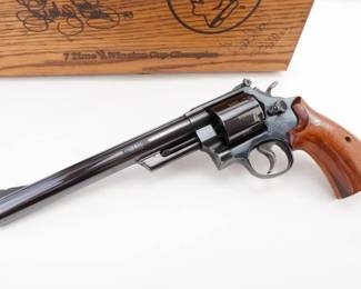 Make: Smith & Wesson
Model: 25-9 Richard Petty Comm.
Caliber: SIGNED .45 COLT
Action: DA
Barrel: 8
Bore: Bright
Serial # RLP0557
Condition: Excellent
Manufactured in 1990 to commemorate winning 7 Nascar championships. One of only 800! The cylinder has the year of each championship highlighted in gold. Has a special "RLP" serial number for Richard Lee Petty. Comes with a hardwood display case lined in blue velvet and SIGNED by the King himself. Remains in excellent condition. Please see photos.