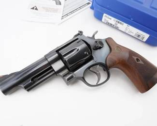 Make: Smith & Wesson
Model: 29-10
Caliber: 44 Mag
Bore: Shiny
Serial # DRJ5448
Condition: Very Good
This genuine Smith & Wesson Model 29 .44 Magnum, produced during its celebrated late 20th-century run, exemplifies American precision engineering. Its robust, double-action revolver design and six-round cylinder deliver formidable stopping power. Immortalized by its starring role in “Dirty Harry,” this firearm has served as both a trusted tool in law enforcement and a cultural icon, making it a prized collectible for enthusiasts of operational excellence and cinematic history. Please see photos.
