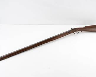 Make: A. Uberti
Model: Kentuckian
Caliber: .50 BP
Action: Percussion
Barrel: 30
Bore: Dark
Serial # 24690
Condition: Very Good
The A. Uberti Kentuckian .50 caliber black powder rifle features a full-length walnut-finished stock, brass furniture, and a color case-hardened lock with a V-type mainspring for quick lock time. Its octagonal barrel, rifled at a 1:66" twist rate, is optimized for patched-ball loads, enhancing accuracy. This model replicates the classic Kentucky rifle, celebrated for its role in early American frontier history. Production dates vary. Please see photos.
