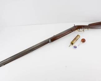 Make: Riddle
Model: Kentucky Rifle
Caliber: .58 BP
Action: Percussion
Barrel: 32
Bore: Dark
Serial # NVM
Condition: Very Good
The Riddle Kentucky Rifle, a .58 caliber black powder muzzleloader, dates to the early 19th century, often associated with the frontier era. Renowned for its accuracy and long barrel, it was a staple in American hunting and military use. This rifle's craftsmanship reflects the work of gunsmiths from Pennsylvania or Kentucky, regions known for producing durable, reliable firearms. It may have been involved in military campaigns, contributing to the success of early American settlers and soldiers. Please see photos.
