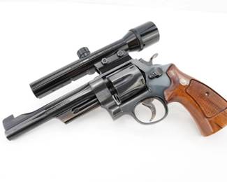 Make: Smith & Wesson
Model: 27-3
Caliber: .357 MAG
Action: DA
Barrel: 6
Bore: Frosty
Serial # AJN9492
Condition: Very Good
This Smith & Wesson 27-3 .357 Magnum revolver, produced in 1980, is a fine example of classic craftsmanship. Featuring a 6-inch barrel and adjustable sights, it's built with precision and reliability. This model comes equipped with a Bushnell Phantom scope, enhancing accuracy for both target shooting and hunting. The combination of the robust revolver and the high-quality scope makes it a sought-after piece for collectors and enthusiasts alike. Please see photos.