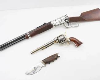 Make: Winchester/ Uberti
Model: AFLAC COMM. SET
Caliber: .45 Colt
Action: Lever
Barrel: 20
Bore: Bright
Serial # 6091236
Condition: Very Good
Exquisitely crafted and limited to 50 sets, this Winchester 94AE .45 Colt commemorative piece is number 19. Commissioned by Aflac and masterfully built by Tom Trolard, renowned author of "Winchester Commemoratives," it features a precision-engineered revolver and a custom knife. Produced in 1994 to honor Aflac’s iconic "Boatman" commercial, it embodies a blend of historic legacy and modern innovation, making it a coveted collectible of exceptional functional excellence and cultural significance. Please see photos.