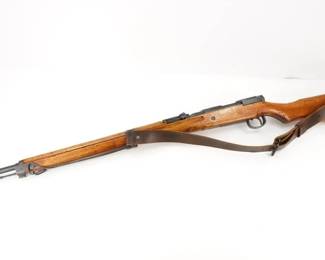 Make: Arisaka
Model: Type 99
Caliber: None marked
Action: Bolt
Barrel: 26
Bore: Frosty
Serial # 43048
Condition: Good
The Type 99 was produced in several versions, and the original standard rifle came with a folding wire monopod intended to improve accuracy in the prone position. It also had a folding rear sight that featured folding horizontal extensions intended for greater accuracy when shooting at aircraft. The monopod and antiaircraft sight extensions were not very effective during the war, so they were eliminated on later rifles. Features a 26†barrel and remains in Good condition showing normal signs of use and wear. Please see all of the photos.