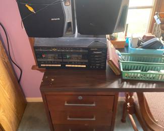 Speakers and desk and more office supplies