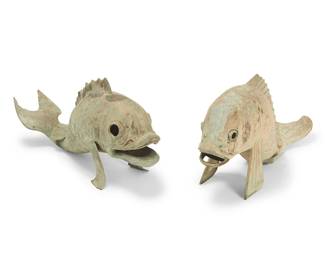 1103
20th century
Two chinoiserie koi fish garden ornaments
Each unmarked
Comprising two brass fish figures, each propped up on front fins, 2 pieces
Taller: 20.5" H x 42.5" W x 14.25" D; Shorter: 19.5" H x 40" W x 11.5" D
Estimate: $500 - $700