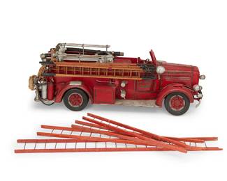 1146
Early/mid-20th century
A vintage hook and ladder fire truck toy
Marked: Lake Mohegan Fire District Engine No. 1 / L.M.F.D.
The red painted wood and metal toy with mounted ladders, spotlights, ropes, hoses, and other accessories, together with four additional associated ladders
Truck: 7.5" H x 22.75" W x 7.25" D; Longest ladder: 23" L
Estimate: $300 - $500