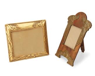 1093
Early 20th century
Two Arts & Crafts picture frames
Comprising a giltwood frame with soft scrolled motifs, and another wood frame with easel back and copper alloy sheet overlay depicting floral motifs, 2 pieces
Easel sight: 5.5" H x 3.375" W; Giltwood sight: 6.5" H x 8.5" W
Estimate: $200 - $300