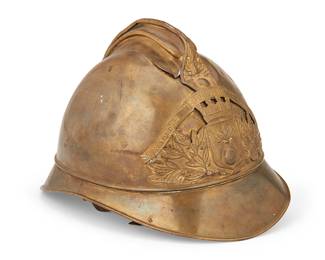 1132
Late 19th/early 20th century; Coulommiers, France
A French pre-war brass fireman helmet
Badge reads: Sapeurs / Pompiers / De Coullommiers
The brass helmet with central fin and front and rear visors, featuring a brass badge bearing foliate motifs centering a shield and castle, the interior with leather webbing and chinstrap
7.25" H x 7.5" W x 10.5" D
Estimate: $400 - $600