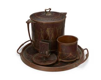 1163
Early 20th century
An Erhard & Sohne smoking set
Each unmarked
The Jugendstil brass and wood veneer inlay set with foliate motifs, comprising a cigarette cup, a match holder, and an ash receptacle depicting musician figures in procession, set on a tray with opposed handles, 4 pieces
Largest receptacle: 8" H x 9" W x 6.5" D; Tray: 1" H x 12.875" W x 11.375" D
Estimate: $400 - $600