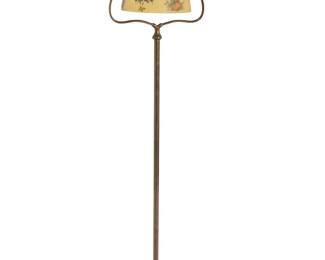 1170
Early 20th century; Meriden, Connecticut
A Handel harp floor lamp
Shade signed: Handel 7176 / RG [possibly Robert Godwin]
Designed 1924, the single-light patinated metal lamp, featuring an articulated acid-etched "chipped" glass shade depicting reverse-painted roses on a yellow ground, electrified
56.75" H x 14" W x 10" D
Estimate: $800 - $1,200