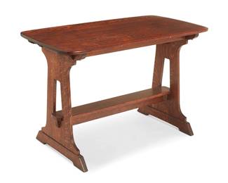 1076
Early 20th century
An Arts & Crafts cutout trestle table
Unmarked
The Limbert's-style wood table with shaped legs joined by a medial stretcher surmounted by a rounded rectangular tabletop
29.25" H x 45" W x 24" D
Estimate: $500 - $700