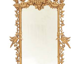 1097
Late 19th century; England
A Chinese Chippendale-style giltwood mirror
The rectangular plate mounted in an openwork chinoiserie decorated frame, featuring scrollwork, foliate motifs, two opposed Ho Ho birds, and an architectural cornice
56.25" H x 38.25" W x 5" D
Estimate: $1,000 - $2,000