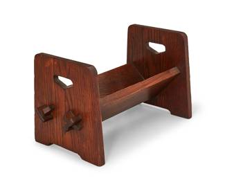 1075
Early 20th century
An Arts & Crafts book trough
Unmarked
The carved wood desktop book trough of keyed mortise and tenon construction, with opposed open handles
9.5" H x 17" W x 9" D
Estimate: $200 - $300